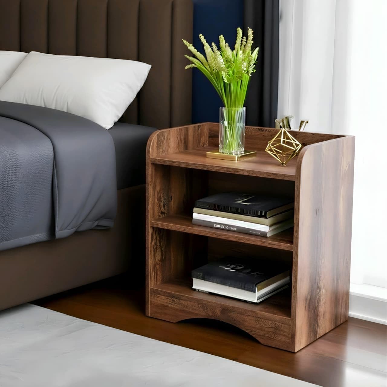 Shoper Cart wooden side table with two open shelves in walnut finish placed beside a bed, budget-friendly engineered wood bedside table